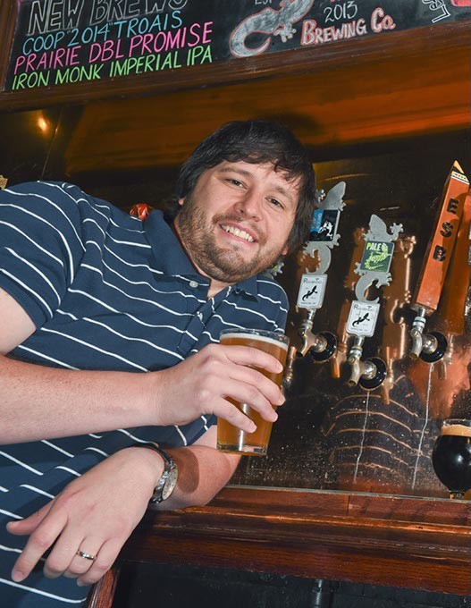 Greg Powell, TapWerks Ale House GM, with samples of local and area beers available during this years Craft Beer Fest, at TapWerks.