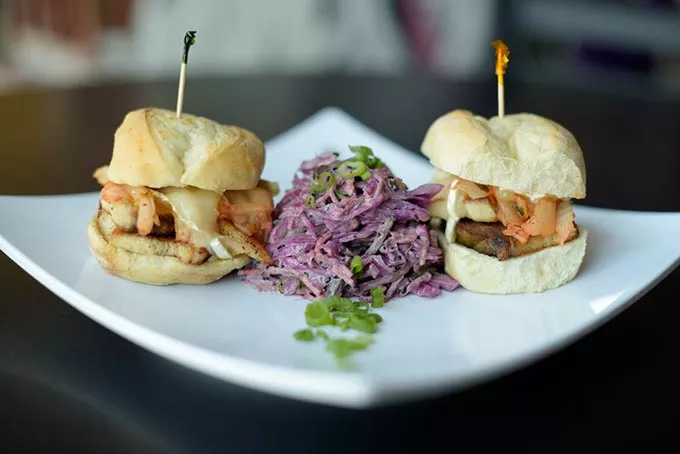 Pork belly brie sliders at Dekora!, Friday, May 5, 2017. - GARETT FISBECK