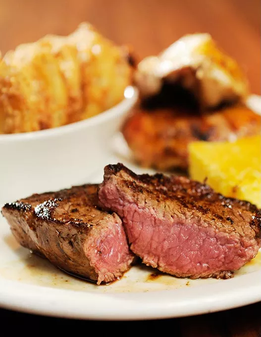 Steak and yardbird combo at Hollie's Flatiron Steakhouse in Moore, Tuesday, Dec. 30, 2014. - GARETT FISBECK