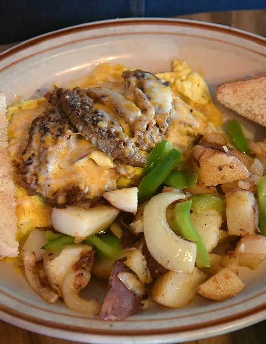 Chelio's everything omelette with home fries. mh