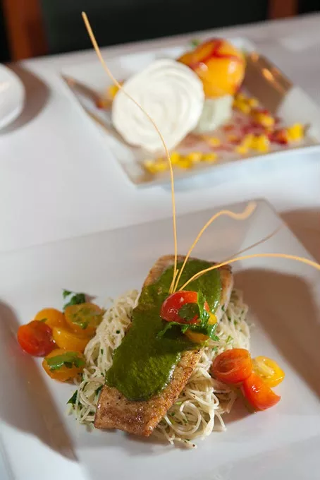 Pan seared halibut with herb pasta, a seasonal menu item at The Metro Wine Bar & Bistro. mh