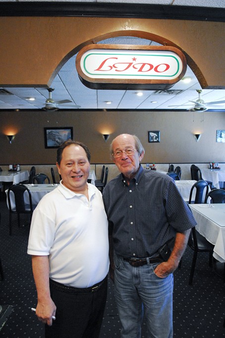 Paul Ly and one of their best customers, Phil Roberts.  mh