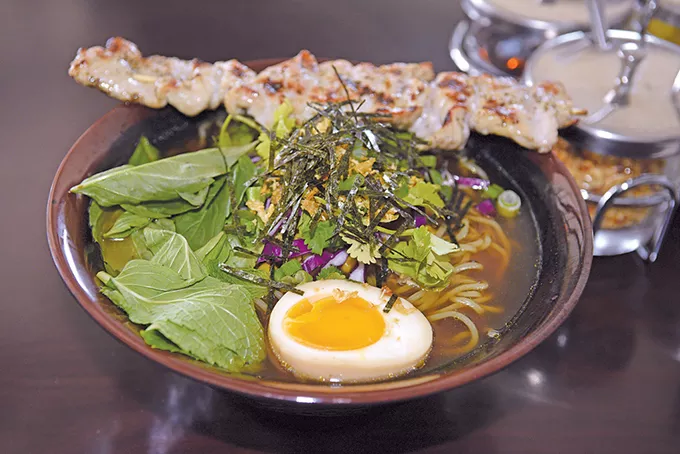 A Noodee bowl with ramen, grilled pork and pork broth. - PHOTO JACOB THREADGILL