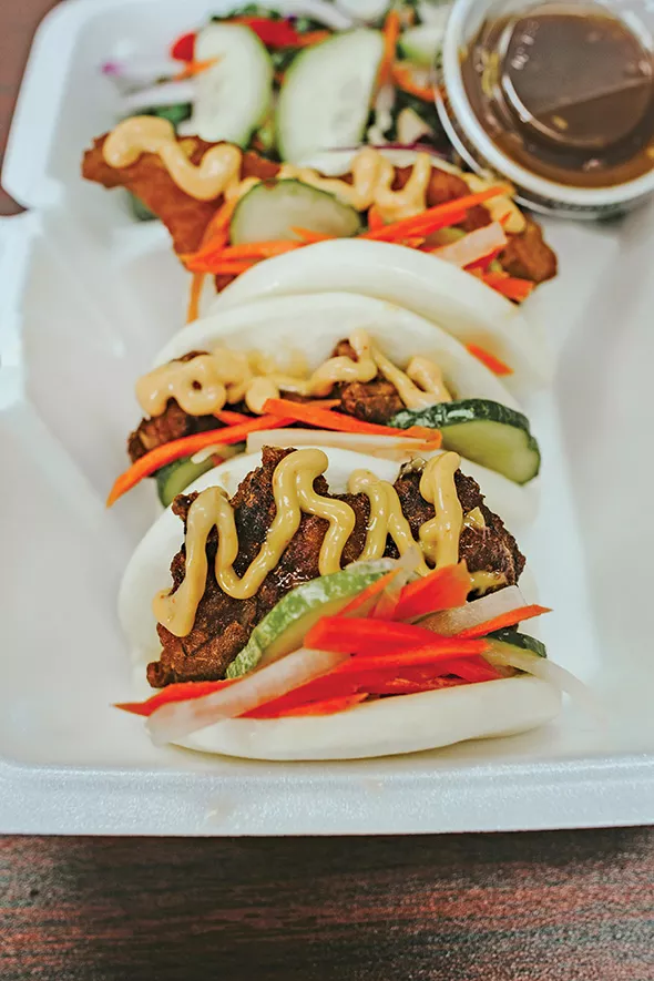 Chop Chop offers three kinds of steam buns, including the Japanese-inspired karaage chicken. - ALEXA ACE