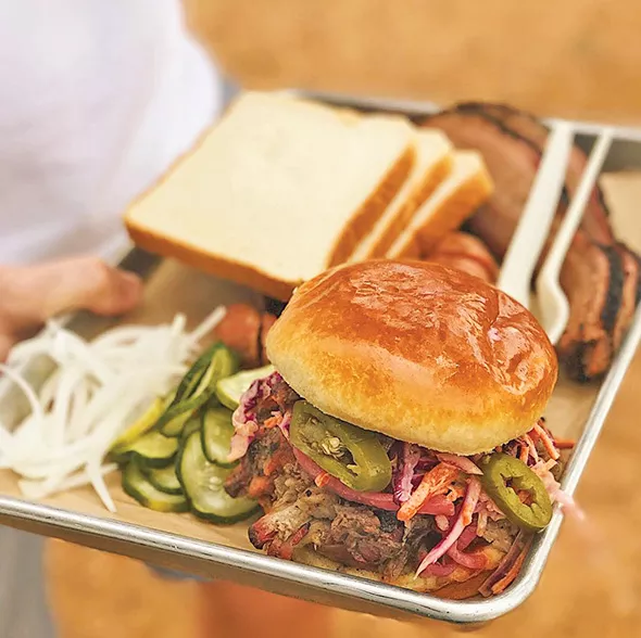 A brisket sandwich topped with coleslaw from Maples Barbecue - PROVIDED