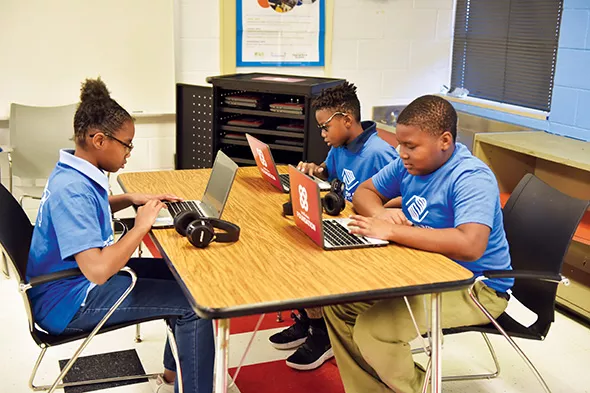 Students at Boys & Girls Clubs of Oklahoma County use new Chromebooks donated to the club from nonprofit organization WorldVentures. - PROVIDED