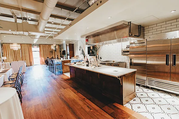The modern kitchen with art deco tiles stands - in contrast to a classical setting elsewhere in Cosabella Kitchen. - ALEXA ACE