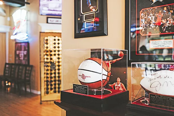 Freddy Nguyen’s friendships with sports legends are reflected in Park Harvey Sushi’s decor and memorabilia. - ALEXA ACE