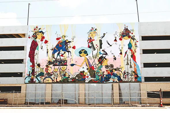 Denise Duong’s “Life in the Light” mural recently went up on West Village Parking Garage. - ALEXA ACE