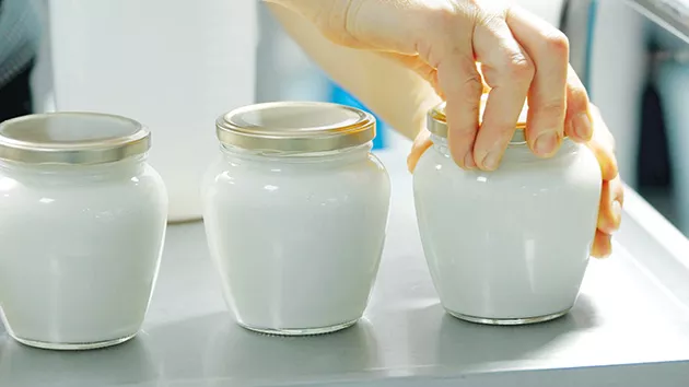 Adding infused cream is one of the final steps to making the ice cream. - BIGSTOCK.COM
