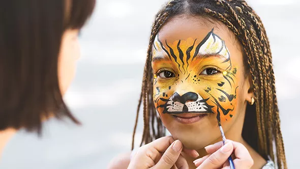 Oklahoma City Pride’s green zone features children’s activities including face painting. - BIGSTOCK.COM