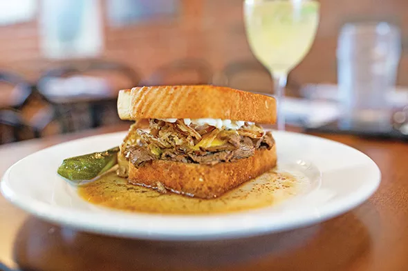The Stateman is housemade roast beef with American cheese, crispy shallots and garlic aioli. - ALEXA ACE