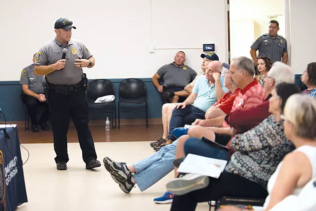 Sgt. Felix Valadez, one of two officers on the Homeless Outreach Team, speaks to community members at a town hall on homelessness. - MIGUEL RIOS