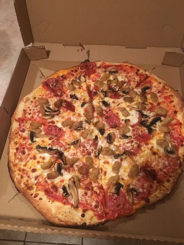 American Favorite pizza from Pizza Planet is mushrooms, pepperoni and sausage. - JACOB THREADGILL