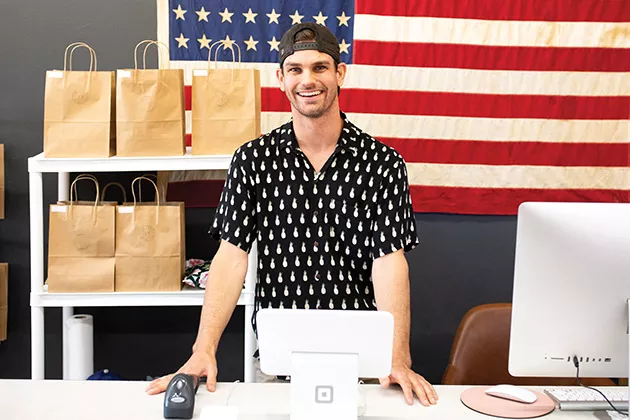 Justin Brooks and his wife Jenna opened You and I Apparel + Gifts last year. - ALEXA ACE