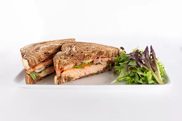 The salmon club served on marble rye bread - PROVIDED