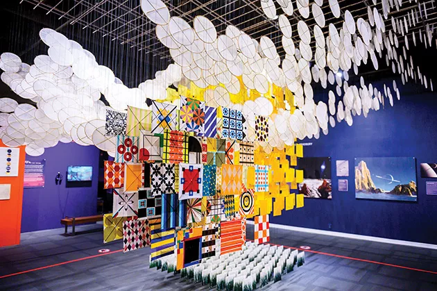 Cosmic Culture — on display through March 29, 2020, in the smART Space gallery at Science Museum Oklahoma — orbits around Jacob Hashimoto’s The Other Sun, an installation constructed from 2,000 bamboo and paper kites. - PROVIDED