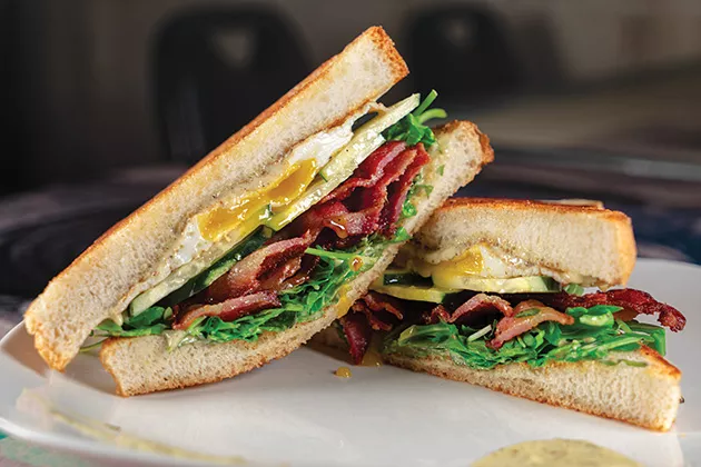 The bacon arugula cucumber sandwich features cannabis-infused mayonnaise. - PHILLIP DANNER
