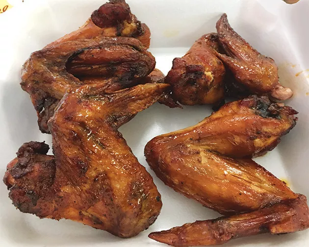 George’s Happy Hog offers smoked wings on Tuesdays and Wednesdays. - JACOB THREADGILL