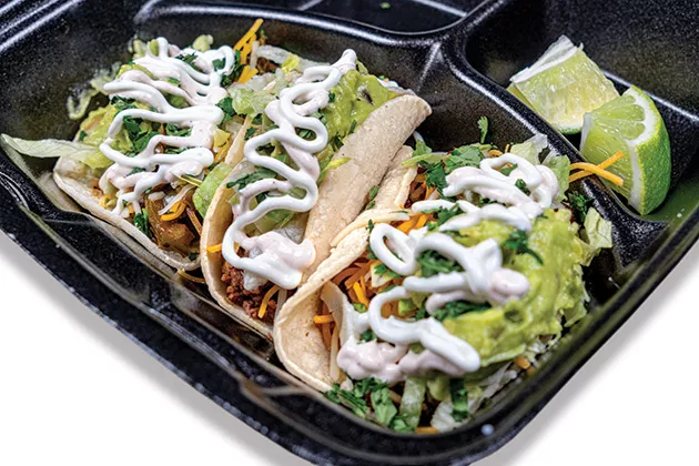 At Oklasoul Cafe, Tuesdays are for tacos topped with guacamole, lettuce, chipotle mayo and cheese. - PHILLIP DANNER