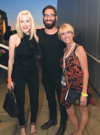From left, Christina Fallin, Michael Cook, and Denise Castella, attending the OKCMOA opening night rooftop party for the DeadCenter Film Festival, 6-11-2015.  Mark Hancock