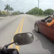 Video captures insanely dangerous Florida road rage battle between a car and a motorcycle