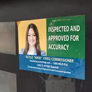 Fight refueled over Florida Ag Commissioner Nikki Fried's stickers on gas pumps