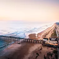 Stroll along Flagler Beach's six miles of cinnamon-red coquina sand facing the Atlantic Ocean