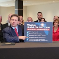 Florida Gov. Ron DeSantis signs bill restricting voting by mail into law as opponents prepare legal challenges