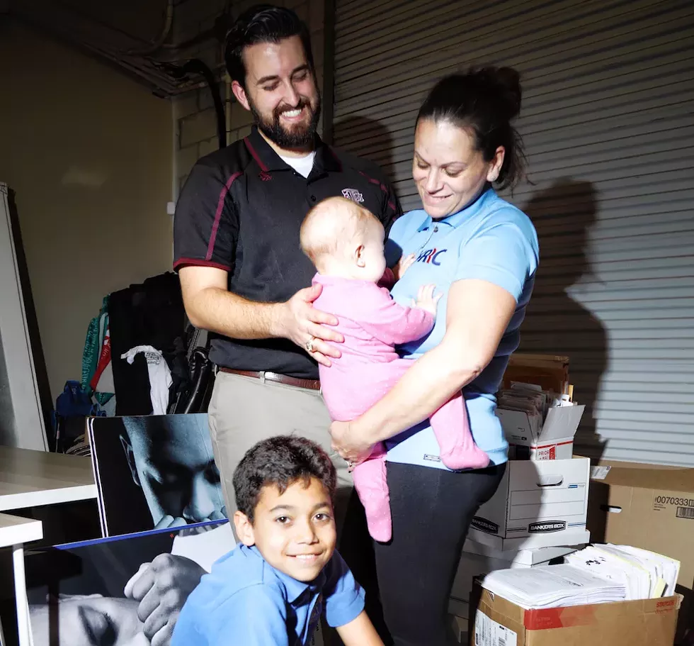 Jessica Younts of the Florida Rights Restoration Coalition with her family - PHOTO BY JOEY ROULETTE