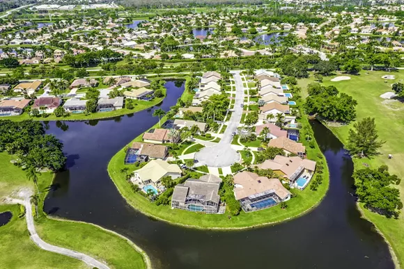 BOCA RATON GATED COMMUNITY PHOTO VIA ADOBE STOCK