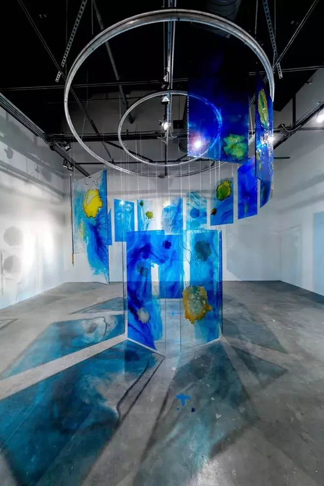 “Below the Surface,” dimensions variable; resin panels, steel wire, steel beads, dyed and burned Japanese paper - PHOTO COURTESY OF MIRA LEHR