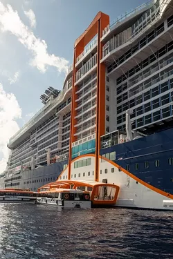 Once on Deck 2, Magic Carpet hovers within a hair above the ocean surface and becomes an extension of the Destination Gateway, a new area that becomes a luxury embarkation station - IMAGE VIA CELEBRITY CRUISES