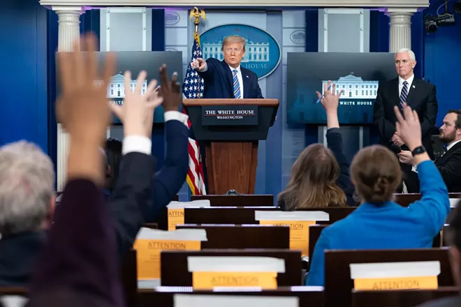 The bloody hand points. - PHOTO BY TIA DUFOUR FOR THE WHITE HOUSE
