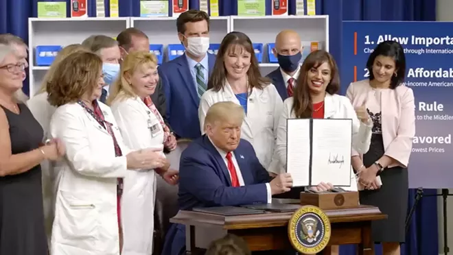 Florida Rep. Matt Gaetz appears behind Donald Trump on Friday. - SCREENSHOT VIA THE WHITE HOUSE/TWITTER
