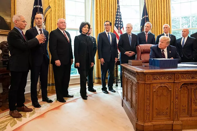 President Donald Trump signing the CARES Act in March - OFFICIAL WHITE HOUSE PHOTO BY SHEALAH CRAIGHEAD