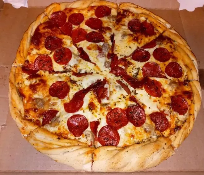 Double-decker pizza from Brad’s Underground Pizza - PHOTO BY LOUIS ROSEN