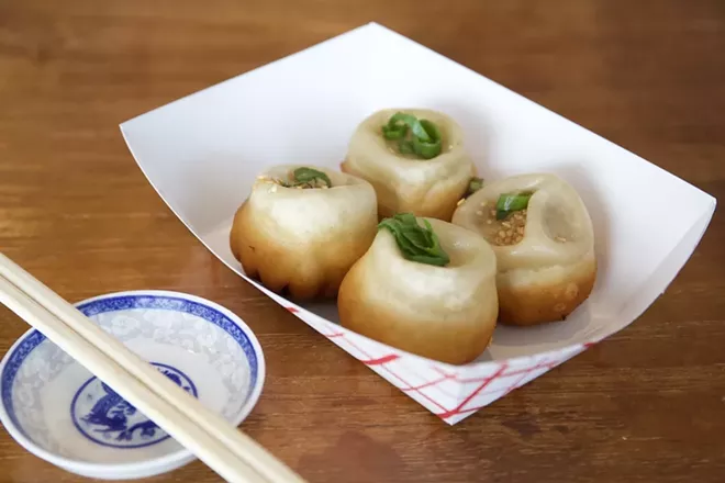 Sheng jian bao (pan-fried pork bun) - PHOTO BY ROB BARTLETT