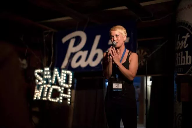 Orlando's own Marie George outshines the Shit Sandwich sign at the Bull and Bush. - PHOTO BY HARRYSON T PHOTOGRAPHY.