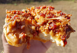 Bacon-caramel donut from The Donut King in Minneola. - PHOTO COURTESY @FOODIENATIONTT ON INSTAGRAM