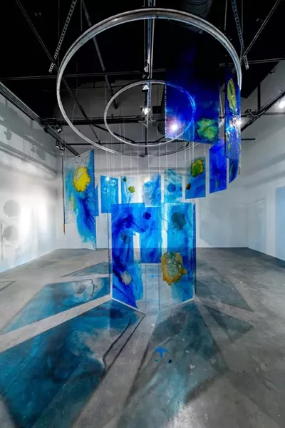 “Below the Surface,” dimensions variable; resin panels, steel wire, steel beads, dyed and burned Japanese paper - PHOTO COURTESY OF MIRA LEHR