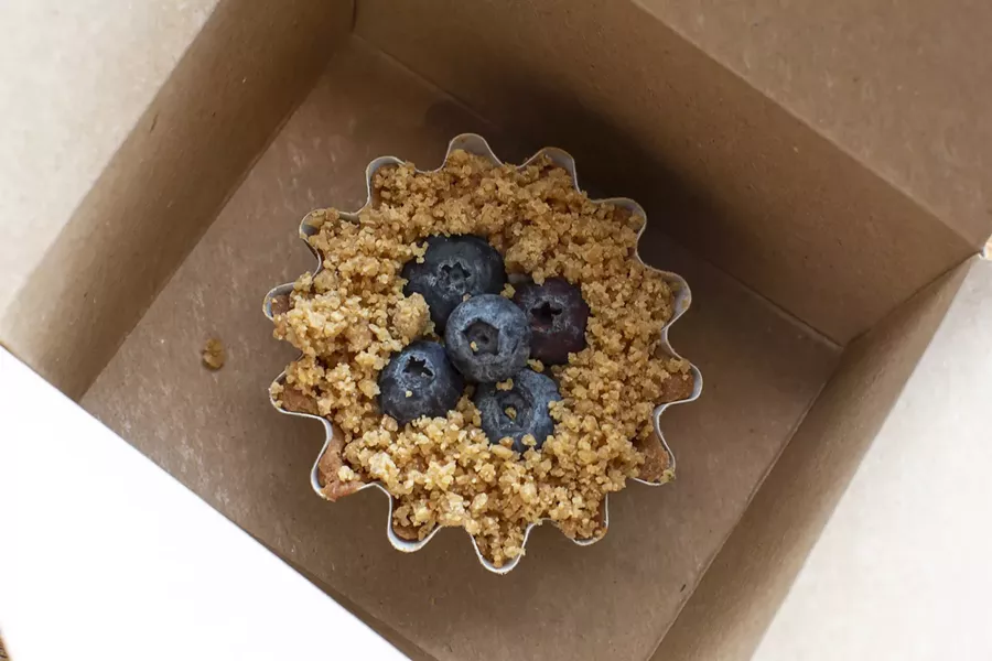 Lemon cream tart with walnut-thyme streusel and blueberries - PHOTO BY ROB BARTLETT