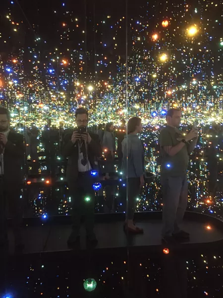 The author in Yayoi Kusama's installation 'The Souls of Millions of Light Years Away'