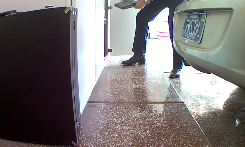 On security tape, Tony Woodrel is seen in the garage of Jerry Krigman's Fountain Hills home. - GOAR INVESTIGATIONS