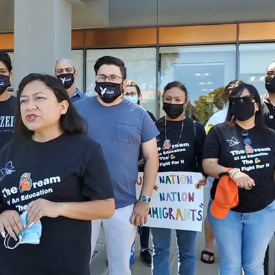 Karina Ruiz speaks at a rally in Phoenix for a pathway to citizenship.