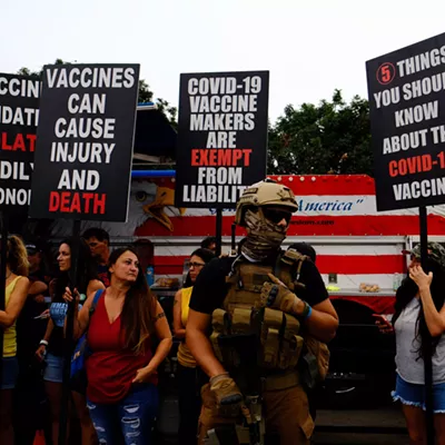 A member of the "Good Citizens" militia at the "Liberty Revolution" rally.