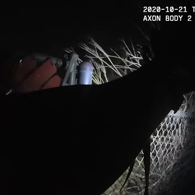A screenshot from body camera footage depicting the shooting of Emmett and George Cocreham.