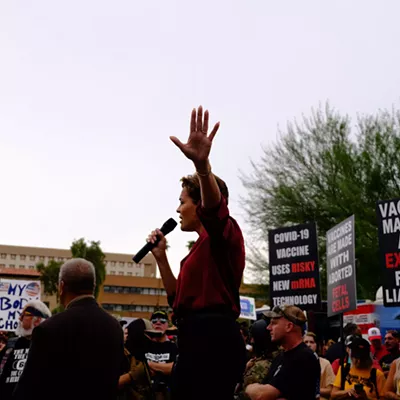 Kari Lake speaks at an anti-vaccine rally in Phoenix.