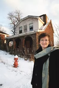 Aggie Brose of the Bloomfield-Garfield Corp. in front of the Kincaid Street property. - HEATHER MULL