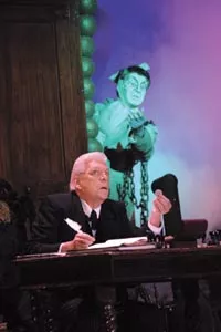 Chains we can believe in: Tom Atkins, as Scrooge, and Dereck Walton, as Marley's ghost, in the CLO's A Musical Christmas Carol. - PHOTO COURTESY OF MATT POLK.